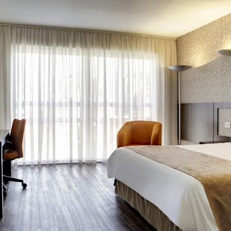Quality Hotel Куритиба Стая снимка